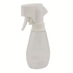 sleek 10 oz (300 ml) white continuous spray bottle with an ergonomic trigger head. The design shows a modern, propellant-free mister used in professional hair salons.