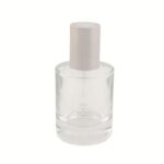 A sleek 1.69 oz (50 ml) clear glass cylinder bottle with a metallic silver press-button dropper cap. The heavy-base glass design conveys a sense of high-end quality and clinical precision.