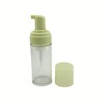 A 90 ml clear glass cylinder bottle with a white foaming pump head. The sleek, vertical design and high-clarity glass showcase a professional solution for premium skincare brands.