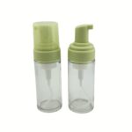 A 90 ml clear glass cylinder bottle with a white foaming pump head. The sleek, vertical design and high-clarity glass showcase a professional solution for premium skincare brands.