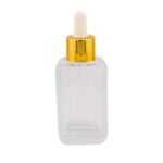 A sleek 1.7 oz (50ml) rectangular clear glass bottle with a aluminum collar and glass pipette. The sharp, modern corners and flat label panels highlight a clinical and professional packaging design.