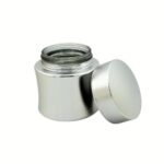 A silver glass cream jar provides a wide-mouth opening for easy access to thicker balms