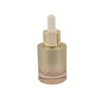 Empty 30ml heavy-wall clear glass bottle with black bulb dropper assembly on a white background.