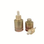 Empty 30ml heavy-wall clear glass bottle with black bulb dropper assembly on a white background.