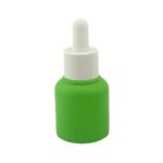 A 20ml green glass dropper bottle featuring a black rubber bulb pipette and a classic round shoulder design.