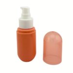 60ml clear capsule-shaped PET plastic bottle for cosmetic lotions and serums.