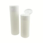 A matte white soft-touch HDPE cylinder bottles with white flip-top dispensing caps in sizes ranging from 100ml to 250ml.